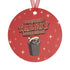 Round red metal Christmas ornament featuring angry possum in Santa hat emerging from trash can. Text reads "Have Yourself a Trashy Little Christmas" in dripping font with stars.
