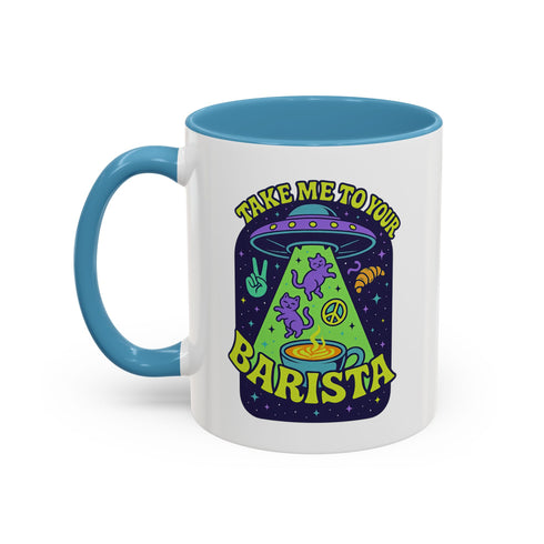 White ceramic coffee mug with a bright yellow handle and interior, featuring a printed alien abduction design with two purple cats, peace signs, and the phrase “Take Me to Your Barista” in green and purple text.