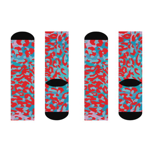 Dive into bold fashion with these vibrant socks featuring an eye-catching red, blue, and pink cheetah print pattern. Perfect for those who love to make a statement, these socks are ideal for brightening up any outfit and showcasing your unique style. Comfortable and stylish with black heels and toes, they are a must-have accessory for the fashion-forward.