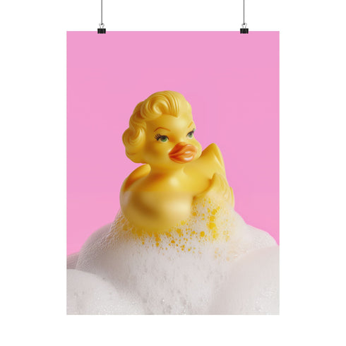 A fine art print of a glamorous rubber duck styled like Marilyn Monroe, with short curled blonde hair and soap bubbles. Displayed in a gold ornate frame against a pink wall with orange bead curtains.