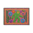 A rectangular flat-printed doormat featuring a faux-tufted, trompe-l'œil texture design. The background is a vibrant hot pink, bordered by a wavy yellow line. In the center is a bright green, smiling Bigfoot or Sasquatch figure with long shaggy hair. Surrounding the cryptid are highly detailed, colorful faux-embroidered floral motifs including blue, orange, and purple daisies, alongside green fern fronds and leaves. The mat is finished with a solid black fabric trim around the outer edge.
