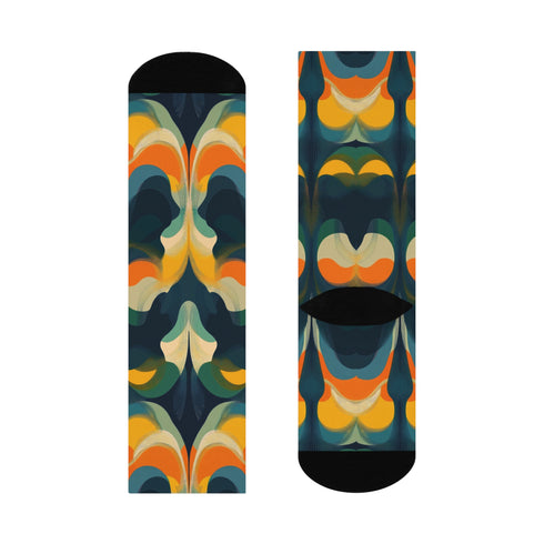 Crew socks featuring a bold ‘70s-style abstract swirl pattern in deep green, orange, yellow, and navy blue.