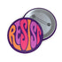Close-up of a glossy, round purple pinback button. The button features the word "RESIST" in a bold, 70s-style psychedelic font that fills the entire surface. The bubbly, wavy letters alternate in color between a vibrant orange, a light peach-pink, and a deep magenta, creating a powerful and retro statement piece. The design has a distinct groovy and feminist protest aesthetic, making it a perfect accessory for jackets, bags, or activist apparel.