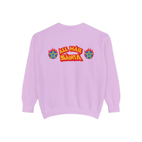 A Christmas sweatshirt featuring a playful design with a cartoon Baphomet goat character wearing a Santa hat. The design includes the text "All Hail Santa" above the goat, with pentagrams in flames on either side. The goat is depicted in a meditative pose, adding a humorous and irreverent twist to holiday attire.