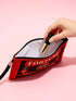 A rectangular red zippered pouch featuring a vintage-style tarot card design. The front displays the word FORTUNE in large beige capital letters. A central illustration shows a mystic eye emitting rays of light above a lit candle flame. The text YES and NO appears on the sides. A banner at the bottom reads LIGHT IT TO KNOW. The bag is crafted from red polyester with a linen-like woven texture, featuring a black zipper and a removable black nylon wrist strap. The interior is white.