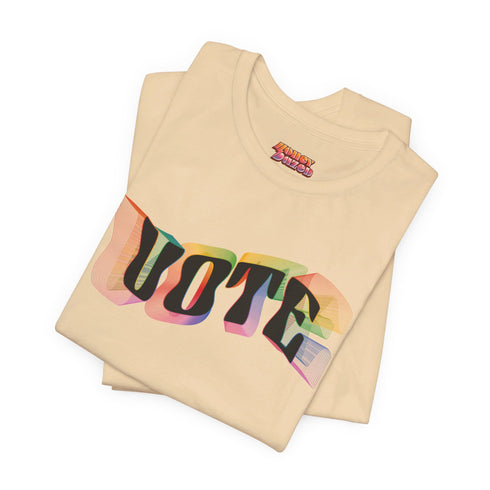 Election 2024 t-shirt with "VOTE" printed in large, colorful letters. Each letter features a different color from the rainbow spectrum, styled in a groovy 70s-inspired font.