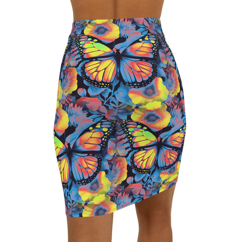 High-waisted bodycon mini skirt with an allover print of rainbow monarch butterflies and colorful tropical flowers on a dark background. Soft, stretchy poly-spandex fabric hugs the body for a flattering fit. Styled for rave, Y2K, and festival outfits. Sizes XS to XL.