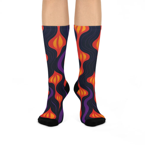 Black crew socks featuring a fiery red, orange, and purple lava-lamp-inspired wave pattern.