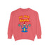 A Christmas sweatshirt featuring a playful design with a cartoon Baphomet goat character wearing a Santa hat. The design includes the text "All Hail Santa" above the goat, with pentagrams in flames on either side. The goat is depicted in a meditative pose, adding a humorous and irreverent twist to holiday attire.