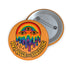 Round orange pinback button featuring bold rainbow psychedelic artwork of a melting third-eye face beneath a rainbow arch. Surrounded by stars and the phrase “Hot, Queer and Radiating” in retro black bubble letters. Glossy metal badge with UV-resistant mylar face and secure safety pin back.