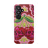 Dual layer matte phone case with a high fidelity 2D print that creates a hyper realistic faux crochet and knit illusion. The central design shows two conjoined cherries styled as bright pink and burgundy human skulls with lime green stems and leaves. The background is a detailed scalloped lace doily pattern in hot pink, deep red, and lime green. Matte finish shell with a black inner TPU lining, precise camera cutout, and open ports. Pastel goth macabre alt fashion phone accessory, made to order.