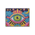 Rectangular entryway doormat with a deep purple background printed in a 2D faux embroidery illusion. The symmetrical mandala centers on a large green, pink, and white evil eye with golden yellow sunburst lines radiating outward. The corners hold textured cyan clouds, yellow crescent moons, and stars, with a scalloped floral motif along the lower edge. Finished with black trim and a non-slip rubber backing. Psychedelic celestial maximalist home decor and protective evil eye welcome mat for bold, eclectic ent