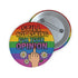 Round glossy pinback button measuring 2.25 inches with a bold rainbow pride flag background. Centered text reads “Still Not Asking For Your Opinion” in black, yellow, blue, and purple letters. Below the text is an illustrated hand with painted red nails giving the middle finger, surrounded by white daisies. The design is printed on tinplate with a scratch- and UV-resistant mylar coating. Button features a strong safety pin backing, perfect for bags, jackets, or pride outfits.