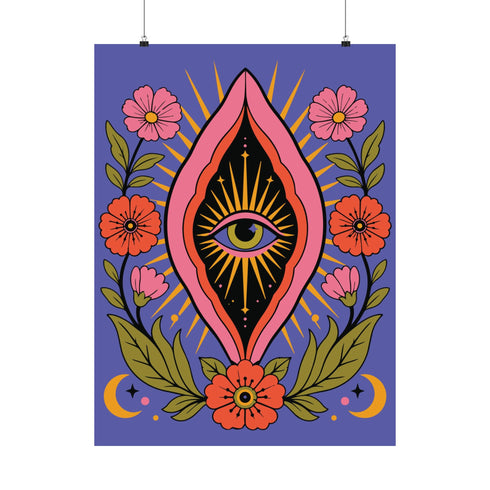 A vertical art print featuring a central pink yoni shape with a black interior containing a single eye. Golden yellow sun rays radiate from the center against a solid periwinkle blue purple background. The central motif is surrounded by a symmetrical botanical border of pink and red daisy flowers and green leaves, with two yellow crescent moons in the bottom corners. Printed on flat museum grade matte paper. This is the printed artwork only; a frame is not included. Ready to frame.