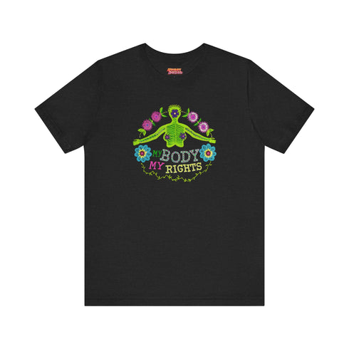 Black unisex t-shirt featuring "MY BODY MY RIGHTS" text with vibrant embroidery-style design of green skeleton figure and colorful flowers. Feminist pro-choice shirt with neon pink, blue, and yellow details available in sizes S-3XL in cotton-poly blend.