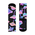 Black crew socks with an allover design of iridescent neon mushrooms in shades of pink, blue, and purple.