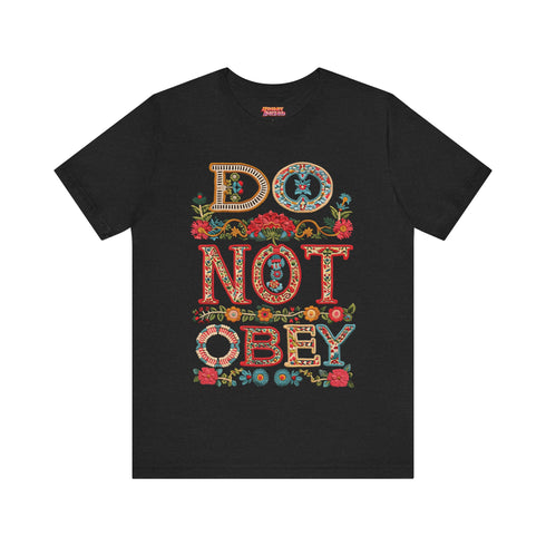 Black T-shirt with bold, embroidered-style text reading "Do Not Obey" surrounded by floral patterns.
