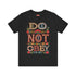 Black T-shirt with bold, embroidered-style text reading "Do Not Obey" surrounded by floral patterns.