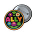 Vibrant ALLY pinback button featuring 70s-style embroidered flowers and lettering in pink, yellow, green, and blue against a black background, surrounded by a rainbow border. A colorful statement accessory combining punk activism and retro flower power aesthetics for backpacks, jackets, and protest wear.