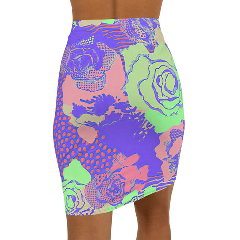 High-waisted bodycon mini skirt with a bold floral collage print in green, purple, and pink. Features comic-style roses and dot patterns on stretchy polyester-spandex fabric. Styled for festivals and summer parties. Available in sizes XS to XL.