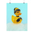 A chic rubber duck styled like Audrey Hepburn’s Holly Golightly, wearing a high bun, yellow bow, black gloves, and a sparkly choker. The duck floats in a pile of foam and is framed in white on a bubbly bathroom shelf with a red tile backdrop and soap dispenser.
