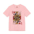 A centralized graphic design of a Queen of Hearts playing card on a cream or pink unisex t-shirt. The Queen is depicted in a maximalist folk art style, holding a heart-topped scepter and a raised fist in a gesture of solidarity. The word "RESIST" is visible on her crown and a central banner in ochre and true red tones. The layout is a centralized medallion style with rust and ochre accents and a playing card border.