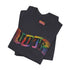 Election 2024 t-shirt with "VOTE" printed in large, colorful letters. Each letter features a different color from the rainbow spectrum, styled in a groovy 70s-inspired font.