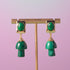 Luxurious earrings featuring gold rectangular studs with oval malachite stones, dangling vibrant green mushroom-shaped malachite charms, perfect for cottagecore aesthetics.