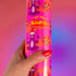 Vibrant pink wrapping paper featuring Occult symbol Baphomet Santas throwing horns, surrounded by flaming pentagrams and "All Hail Santa" text. A punk rock twist on Christmas gift wrap.