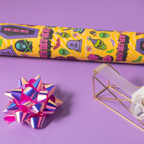 30th Birthday, darkly humorous wrapping paper with neon skulls, tombstones, coffins, and phrases like "Youth Dies Here" and "RIP 20s."