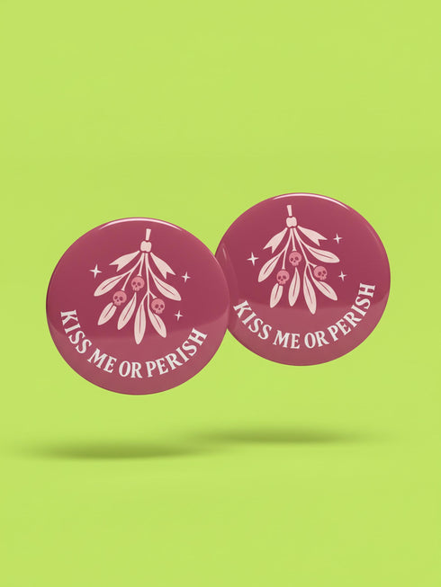 Set of 4 1.75 inch round pastel goth holiday pinback buttons. 1: Light pink with Baphomet head in wreath reading Merry Hexmas Hail Yourself. 2: Dark mauve with skull mistletoe reading Kiss Me or Perish. 3: Dark mauve with coffin stocking and black cat reading All I Want is Doom. 4: Light pink with cute Baphomet holding a sack reading Naughty on Purpose. All feature durable tinplate construction, high gloss laminate finish, and a secure metal safety pin back.