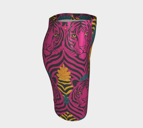 High-waisted mini skirt with bold psychedelic tiger print in hot pink, teal, yellow, and black. Features a form-fitting pencil silhouette with an elastic waistband. Available in eco-poly performance or glitter finish. Unique maximalist style for festivals, summer parties, or rave fashion. Sizes S–XL.