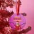 Round purple metal Christmas ornament featuring Drag Queen Divine in Santa hat and red dress with colored Christmas lights. Text reads "Have A Divine Christmas" in retro psychedelic lettering.