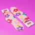 a close up of a pair of socks on a pink background