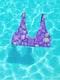 Bralette-style bikini top featuring a high neckline and vibrant jellyfish print in iridescent purples, blues, and greens on a lilac background. Made of recycled polyester and LYCRA XTRALIFE, this double-layered swim top includes removable padding, UPF 50+ protection, and is available in sizes XS to 3XL. Great for raves, beach days, and summer festivals.