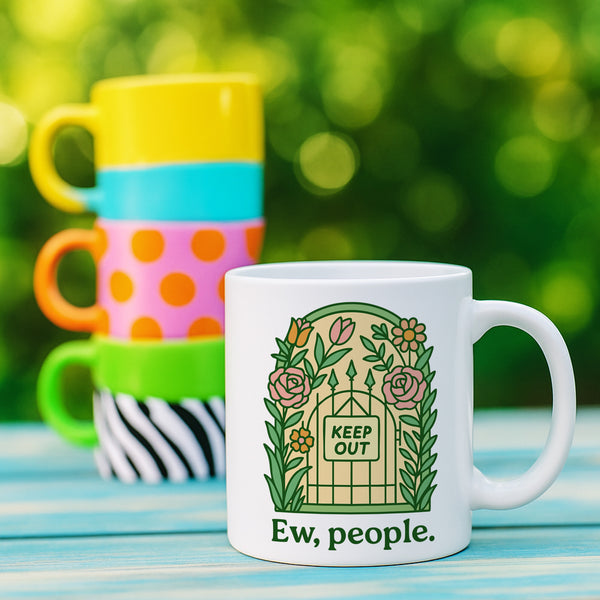 White ceramic coffee mug featuring "Ew, people" text beneath decorative garden gate design with "KEEP OUT" sign surrounded by roses and botanical florals. Perfect antisocial gift for introverts who prefer solitude over social interaction. 11oz ceramic cup ideal for coffee lovers, misanthropes, and homebodies who embrace their hermit lifestyle.