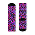 Coquette-style crew socks featuring a bold black background with hot pink and purple psychedelic squiggles, cherries, and shiny pink bows. Made of a soft polyester-spandex blend with reinforced black toe and heel. Fits US women's sizes 5–12 and men's up to 12. Stretchy, colorful, and cute for dopamine dressing.