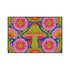 A rectangular polyester mat featuring a large central mushroom with a lime green cap, orange spots, and a pink underside. The design is surrounded by four large magenta and pink radial flowers with yellow centers. Bright green leaves and orange scrolling vines fill the spaces on a deep cobalt blue background. The artwork uses a tapestry-style visual effect to mimic the look of raised embroidery on a flat, printed surface. The mat is finished with a clean black stitched edge.