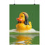 A fine art print of a rubber duck inspired by Marley, featuring black dreadlocks and a red-yellow-green beanie. The duck floats in bath bubbles with its reflection in green-tinted water. Displayed in a white and red frame on a soap-covered shelf in a bold red tile bathroom with a lightning-bolt soap dispenser.