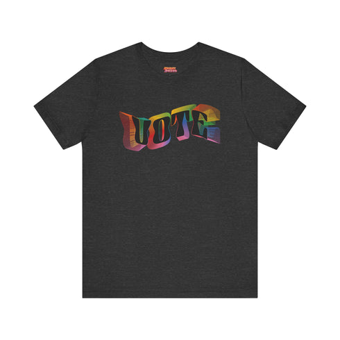 Election 2024 t-shirt with "VOTE" printed in large, colorful letters. Each letter features a different color from the rainbow spectrum, styled in a groovy 70s-inspired font.
