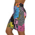 High-waisted mini skirt with a multicolor floral collage print featuring graphic roses, polka dots, and stripes. Bodycon fit in a bright palette including pink, yellow, blue, and orange. Made of stretchy poly-spandex blend and styled in colorful festival outfits. Sizes XS to XL available.