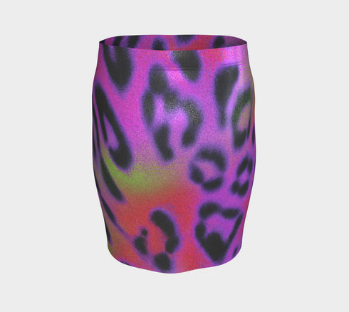 A high-waisted, bodycon mini skirt with a vibrant psychedelic floral pattern. The curve-hugging skirt features a mid-thigh length and black stitching at the waistband and hem. The all-over print consists of abstract, fuzzy-edged floral bursts in electric colors, including hot pink, magenta, neon green, and electric purple, set against a black background. The skirt is shown in two finishes: a smooth, matte signature knit and a metallic glitter knit with a reflective silver foil.
