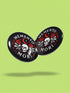 A collection of four glossy black circular pinback buttons featuring striking red and white gothic illustrations. One button shows "Midnight Graveyard Society" text with bats and tombstones. Another reads "Cemetery Picnic Society" with a coffin and umbrella icon. A third features a detailed white skull and red roses with "Memento Mori" text below. The final pin displays "Nocturnal Flower Society" surrounded by floral vines.