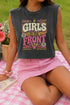 A women's garment-dyed muscle tee in faded charcoal grey, featuring a boxy, slightly cropped fit with structured shoulders and a wide ribbed collar. The center chest displays a retro graphic reading GIRLS TO THE FRONT in cream and magenta bubbly typography. The text is surrounded by vintage motifs including white daisies, yellow and purple stars, wavy ribbon banners, pink and yellow checkerboard borders, and a bottom radial sunburst in orange and magenta. Made of one hundred percent cotton.