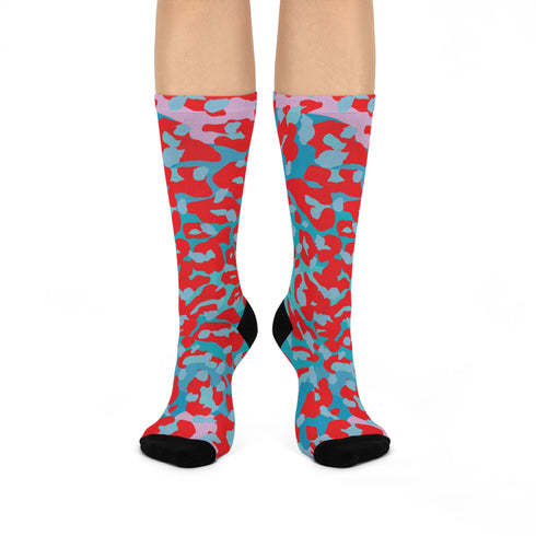 Dive into bold fashion with these vibrant socks featuring an eye-catching red, blue, and pink cheetah print pattern. Perfect for those who love to make a statement, these socks are ideal for brightening up any outfit and showcasing your unique style. Comfortable and stylish with black heels and toes, they are a must-have accessory for the fashion-forward.