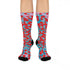 Dive into bold fashion with these vibrant socks featuring an eye-catching red, blue, and pink cheetah print pattern. Perfect for those who love to make a statement, these socks are ideal for brightening up any outfit and showcasing your unique style. Comfortable and stylish with black heels and toes, they are a must-have accessory for the fashion-forward.
