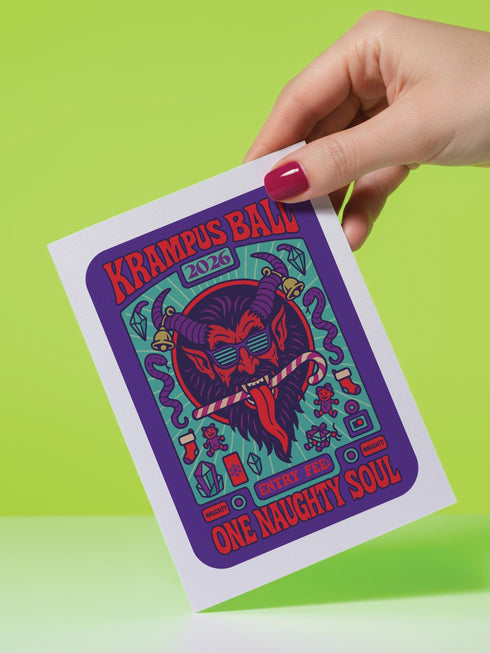 A vertical 5x7 inch folded greeting card featuring a detailed, psychedelic illustration of the folklore figure Krampus for a New Year celebration. The card stock has a shimmering pearlescent finish that reflects light, creating a glowing effect on the purple and teal artwork. The design mimics a vintage event poster reading "Krampus Ball 2026" and "Entry Fee: One Naughty Soul" in retro fonts. Krampus is depicted with large horns, sunglasses, and a long tongue holding a candy cane.
