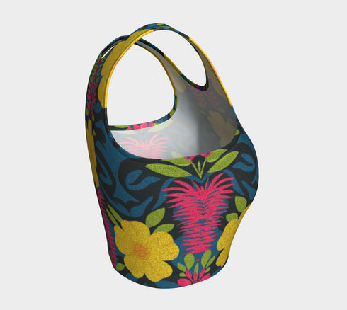 Honey Dazed Brand body-hugging racerback crop top featuring retro floral print with bright yellow flowers, pink geometric patterns, and blue swirls on dark background in performance knit fabric