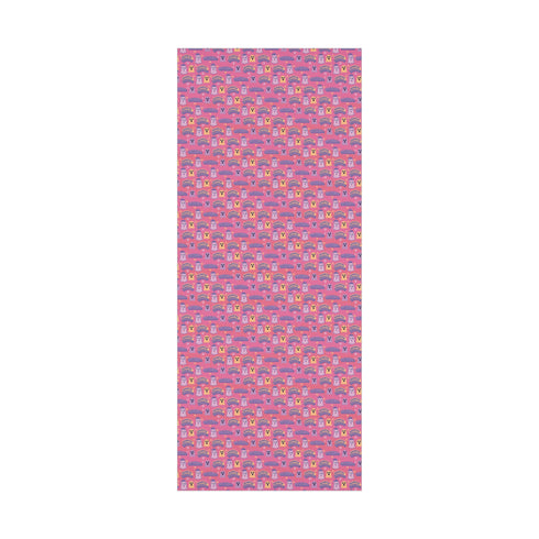 Bright pink christmas wrapping paper covered in cute ghost characters wearing Santa hats, with "Haunted Holiday" and "Boo Humbug" text, and snowflake accents.