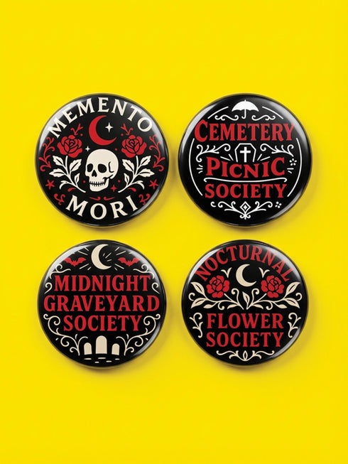 A collection of four glossy black circular pinback buttons featuring striking red and white gothic illustrations. One button shows "Midnight Graveyard Society" text with bats and tombstones. Another reads "Cemetery Picnic Society" with a coffin and umbrella icon. A third features a detailed white skull and red roses with "Memento Mori" text below. The final pin displays "Nocturnal Flower Society" surrounded by floral vines.